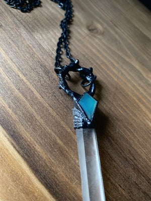 
            
                Load image into Gallery viewer, Twig Wreath Quartz + Chalcedony Shield Necklace
            
        