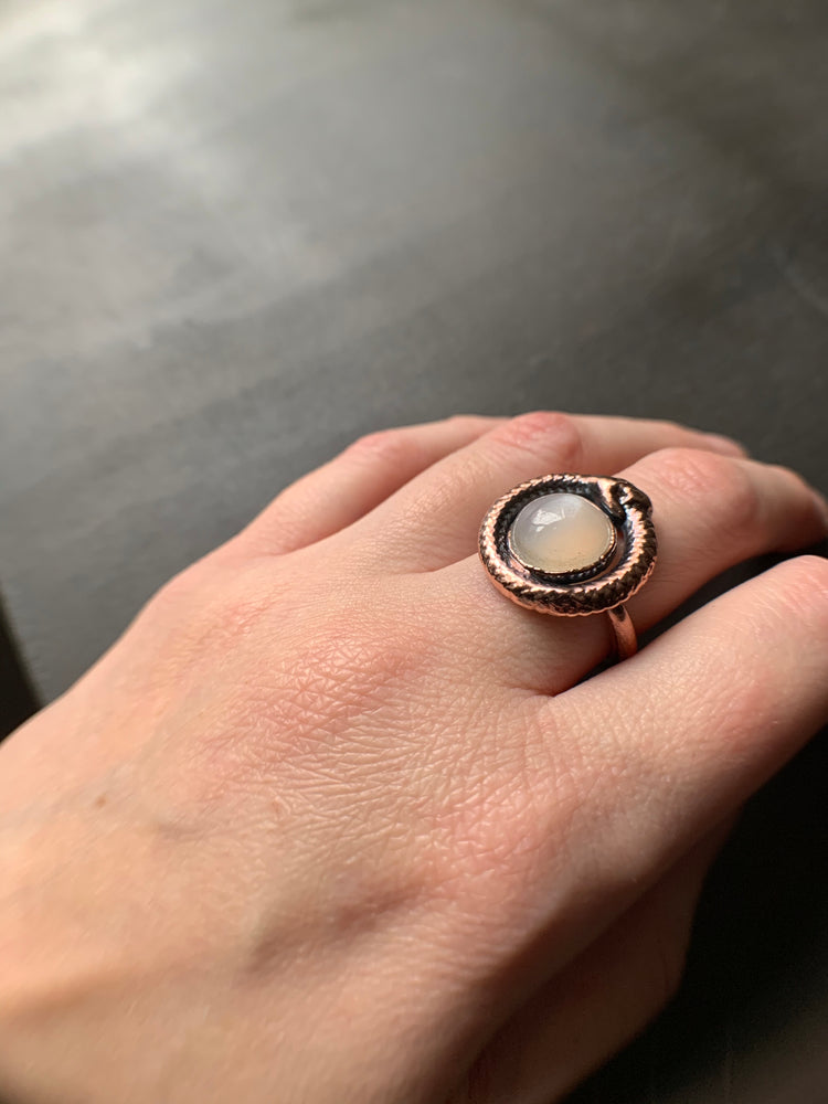 
            
                Load image into Gallery viewer, OUROBOROS MOONSTONE RING, VARIOUS SIZES
            
        
